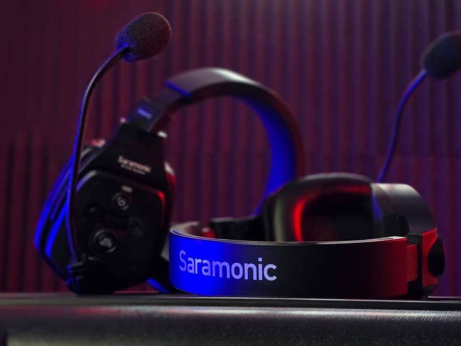 A professional headset with a boom microphone on a desk