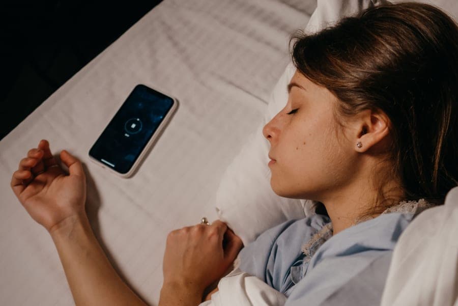 A person asleep resting their head to one side