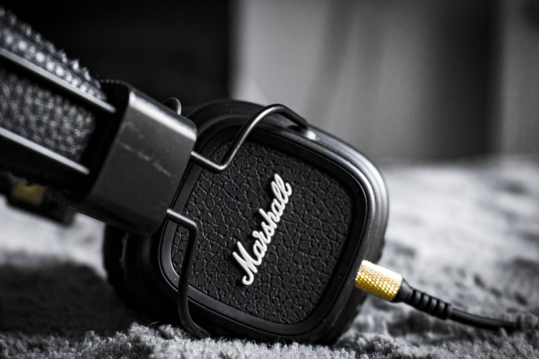 A close-up of a compact pair of on-ear headphones
