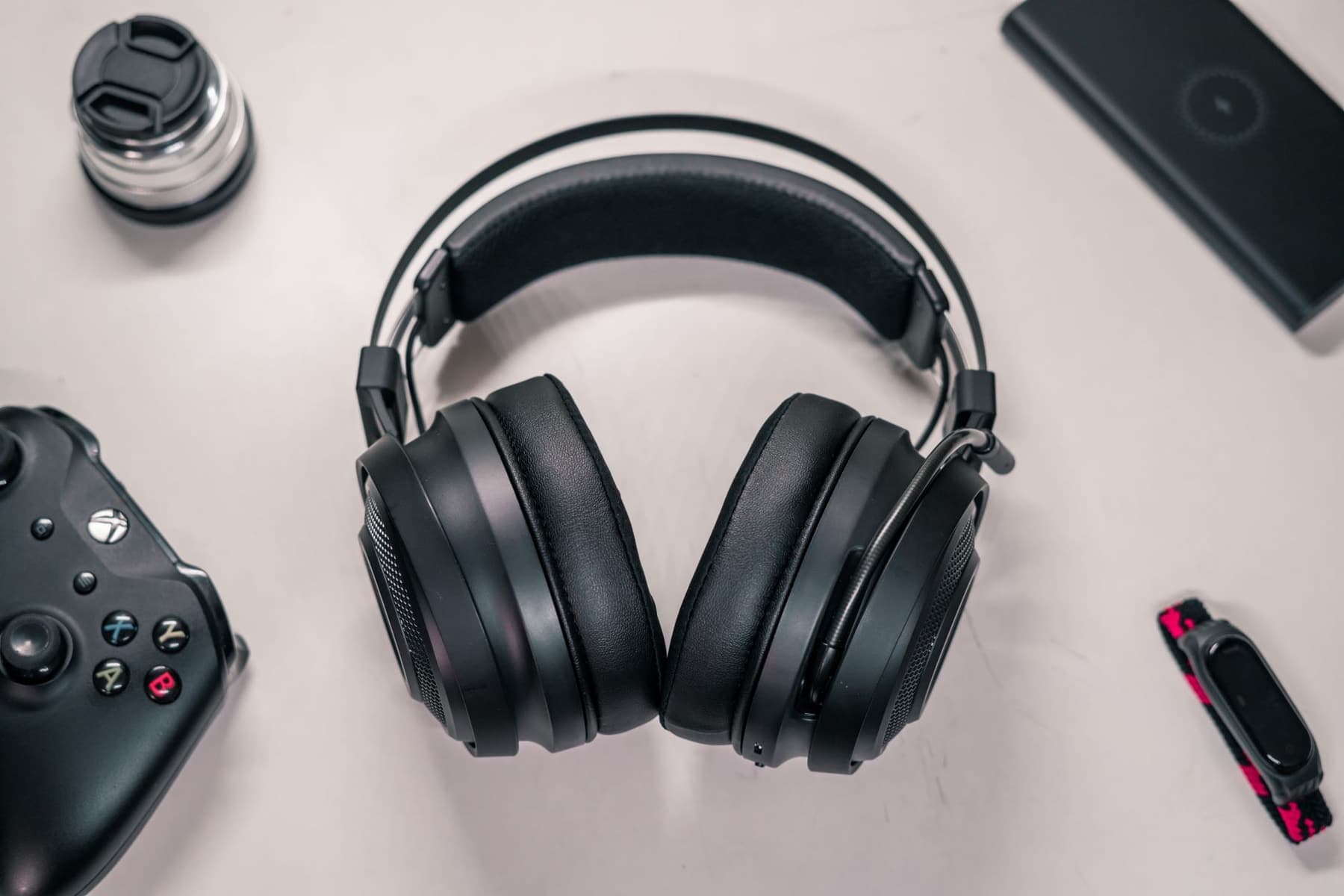 Black over-ear headphones photographed flat on a white surface